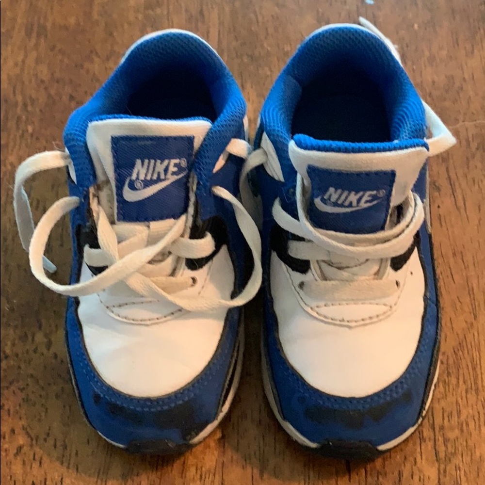 Gently used toddler 7C Nike Air Max leather shoe.